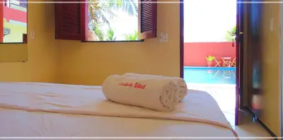 Uma cama ou camas num quarto em Pousada Vital