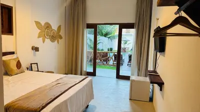 Uma cama ou camas num quarto em Vila Marina Icaraizinho