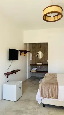 Uma cama ou camas num quarto em Vila Marina Icaraizinho