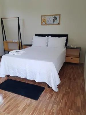 Uma cama ou camas num quarto em Pousada Mad Horse