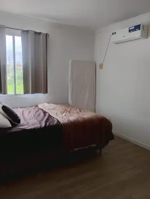 Uma cama ou camas num quarto em Apartamento 3 quartos avenida do futuro