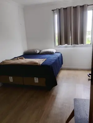 Uma cama ou camas num quarto em Apartamento 3 quartos avenida do futuro