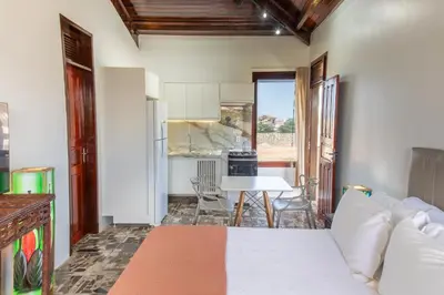 A cozinha ou kitchenette de Beachfront Studio with Pool Caponga