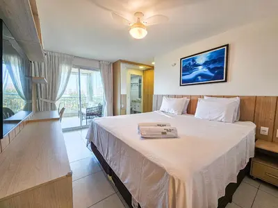 Uma cama ou camas num quarto em Golf Ville Resort, Porto das Dunas, Aquiraz
