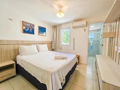 Uma cama ou camas num quarto em Golf Ville Resort, Porto das Dunas, Aquiraz
