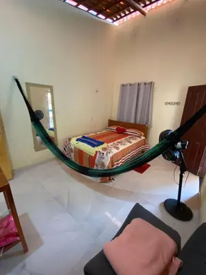 Uma cama ou camas num quarto em Pousada da vila