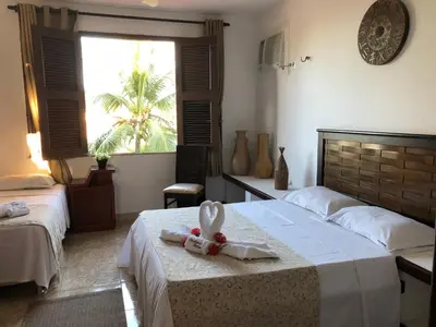 Uma cama ou camas num quarto em Shekinah House