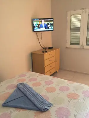 Uma cama ou camas num quarto em Pousada Villa Calango