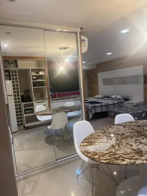 Uma área de estar em Apartamento Fortaleza Beira Mar