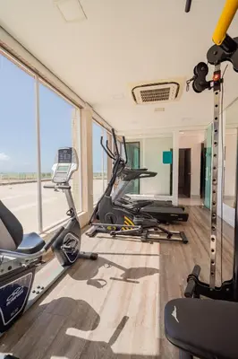 O centro de fitness e/ou as comodidades de fitness de Crocobeach Hotel