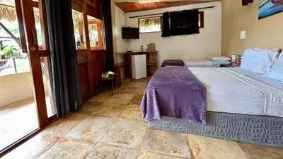 Uma cama ou camas num quarto em Pousada MYM DUNAS 3x
