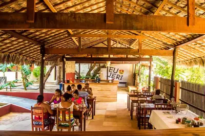Um restaurante ou outro lugar para comer em Pousada MYM DUNAS 3x
