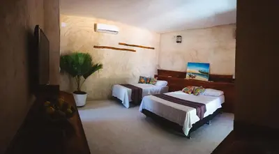 Uma cama ou camas num quarto em Pousada MYM DUNAS 3x