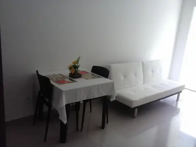 Uma área de estar em VG Fun Residence