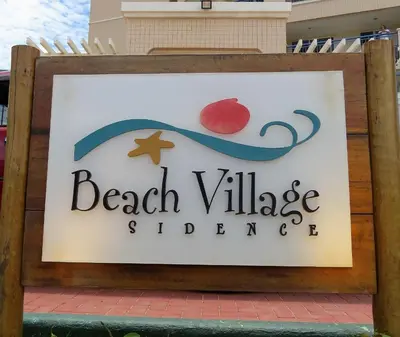 Um certificado, prémio, placa ou documento mostrado em Beach Village Residence