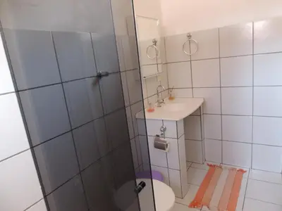 Uma casa de banho em Nossa Casa em Jeri