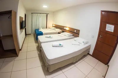 Uma cama ou camas num quarto em Pousada Mar Aberto