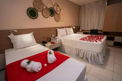 Uma cama ou camas num quarto em Fortaleza Mar Hotel