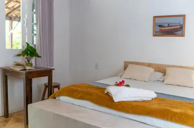 Uma cama ou camas num quarto em casa jasmin