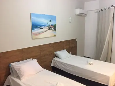 Uma cama ou camas num quarto em Blue Beach Apartments