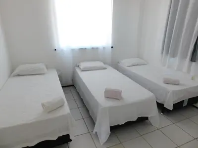 Uma cama ou camas num quarto em Blue Beach Apartments