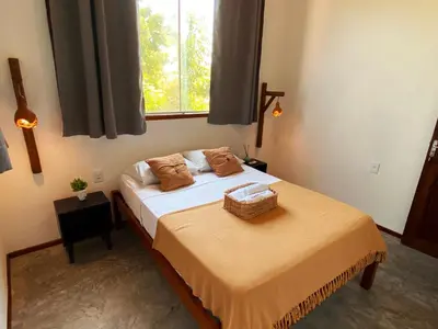 Uma cama ou camas num quarto em Mandala Hostel Jeri