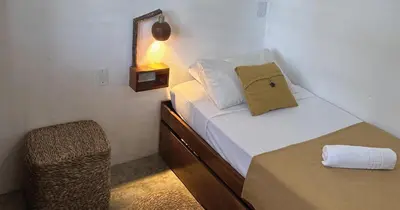 Uma cama ou camas num quarto em Mandala Hostel Jeri