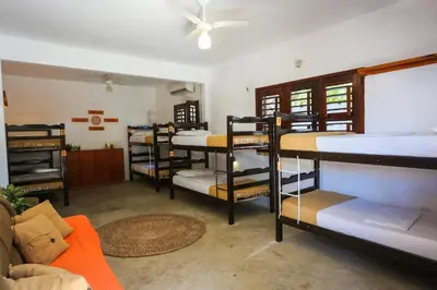 Uma cama ou camas num quarto em Mandala Hostel Jeri