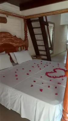 Uma cama ou camas num quarto em Pousada Lua Vermelha