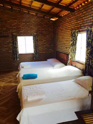 Uma cama ou camas num quarto em Pousada Sol e Mar