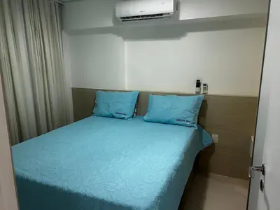 Uma cama ou camas num quarto em Apartamento Mobiliado Fortaleza-Landscape Beira-Mar
