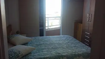 Uma cama ou camas num quarto em Flat Studio Iracema apto 602