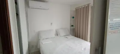 Uma cama ou camas num quarto em Apartamento em Fortaleza Beach Class-uma quadra Praia