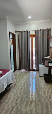 Uma cama ou camas num quarto em Pousada e Restaurante Paraíso Natural