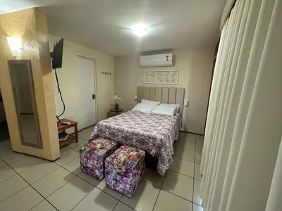 Uma cama ou camas num quarto em Apartamento Em Andar Alto com Vista Mar Meireles
