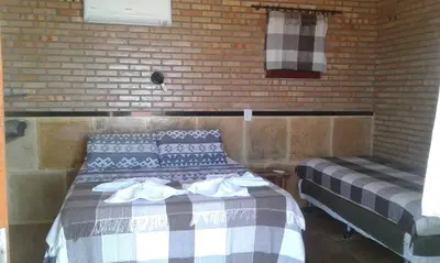 Uma cama ou camas num quarto em Mar à vista