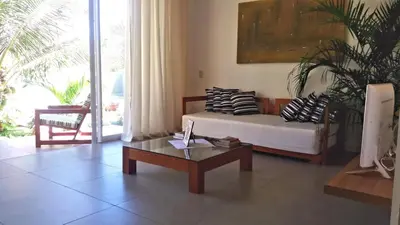 Uma área de estar em Ravenala Hotel Boutique