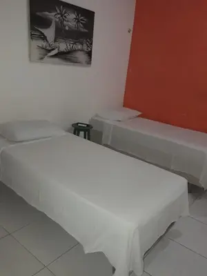 Uma cama ou camas num quarto em Pousada do Castelo