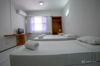 Uma cama ou camas num quarto em Rede Andrade Coimbra