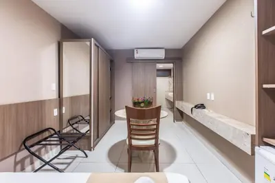 Uma cama ou camas num quarto em Amuarama Hotel