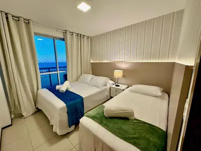 Uma cama ou camas num quarto em Terraços do Atlantico - Beira mar de Iracema