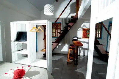Uma televisão e/ou sistema de entretenimento em Barriga Da Lua Flats
