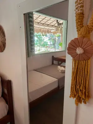 Uma cama ou camas num quarto em Cabaré Du Vento