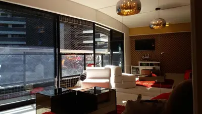 Uma área de estar em Apartamento na Beira Mar de Fortaleza - Edifício Landscape