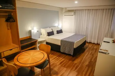 Uma cama ou camas num quarto em Bristol Jangada Fortaleza Meirelles