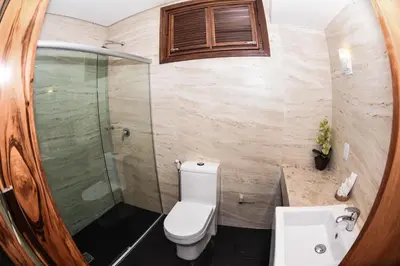 Uma casa de banho em Genus Beach Hotel