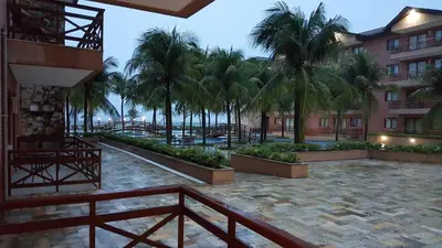 Um jardim no exterior de Manacá Apartamentos , Kariri Beach , Cumbuco