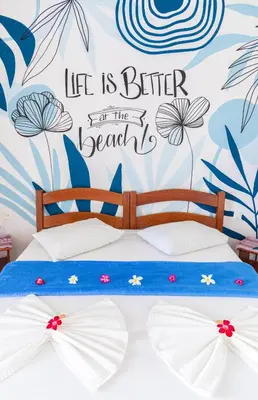Uma cama ou camas num quarto em Cumbuco Kite in Paradise e Hospedaria