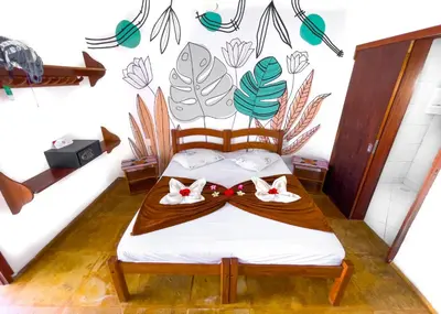 Uma cama ou camas num quarto em Cumbuco Kite in Paradise e Hospedaria