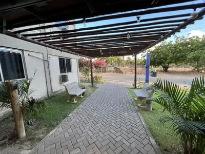 Um jardim no exterior de Pecém Hotel